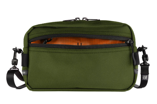 A Side Effect in Saguaro 630 Ballistic with Persimmon (dark orange with orange grid) 210 Cerylon interior.